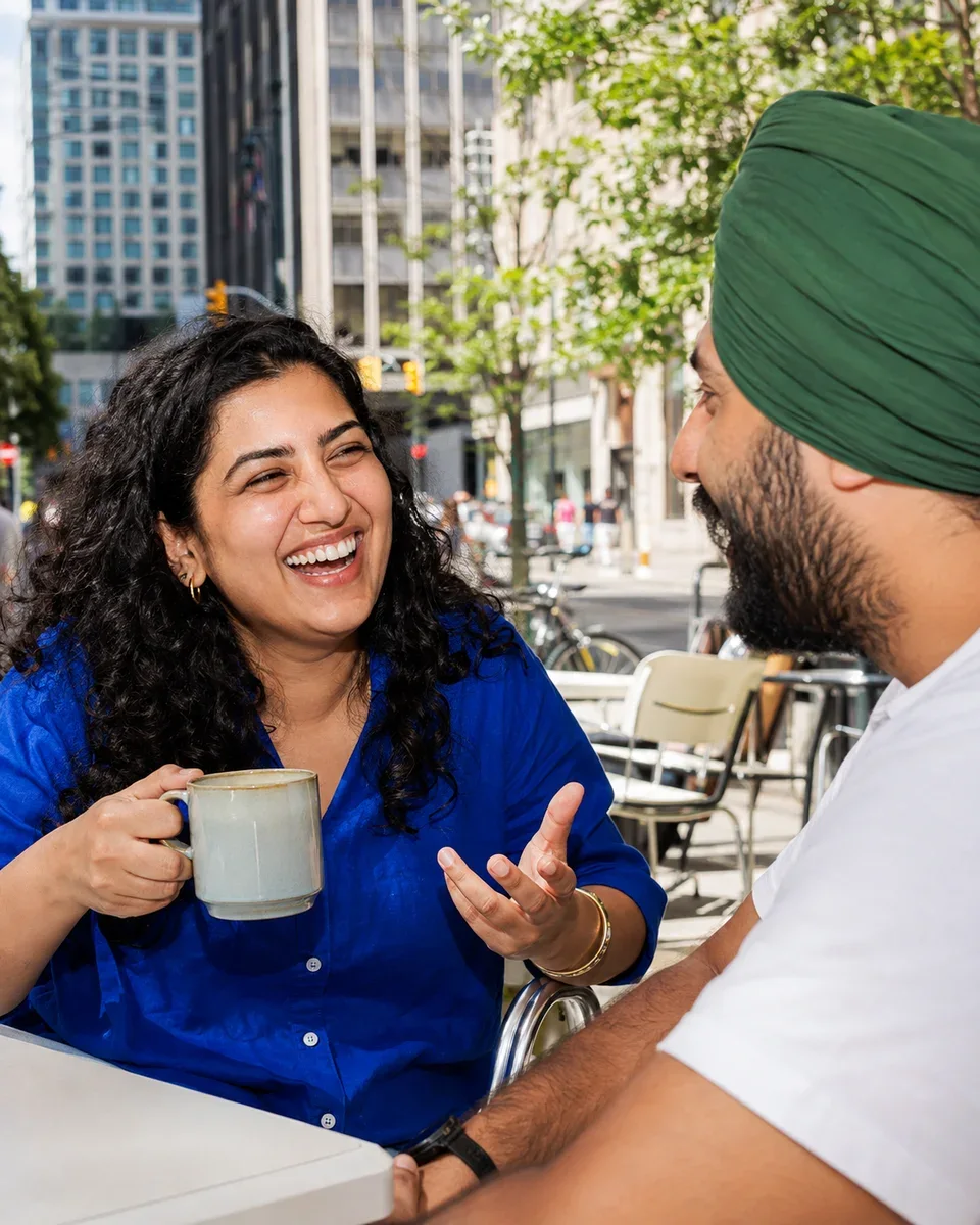 Illustrative scene of two adults enjoying a conversation at an outdoor cafe